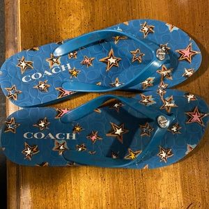 Barley worn blue colored coach flip flops size 7-8